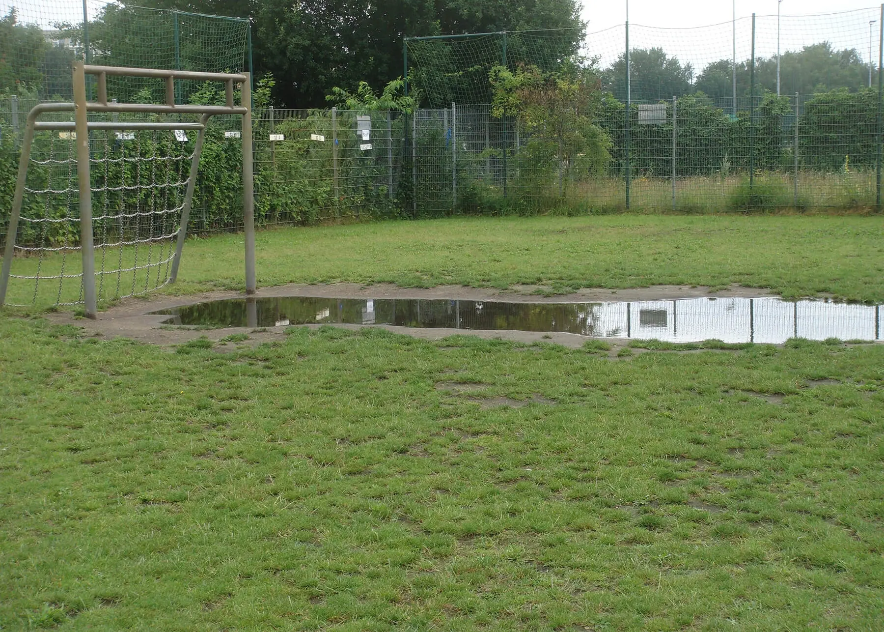 Current muddy sports field at ISB